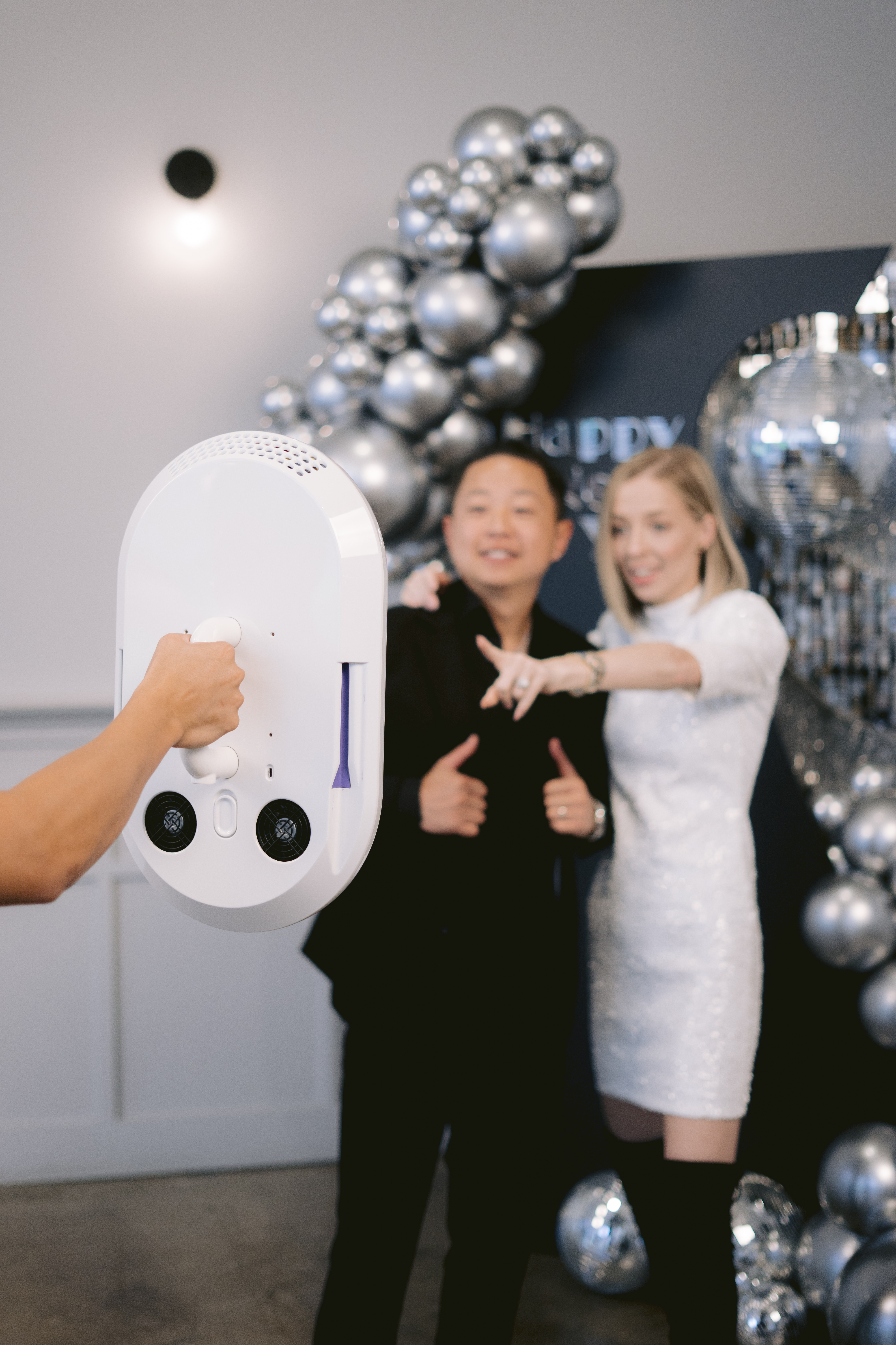 Guests choosing filter on booth